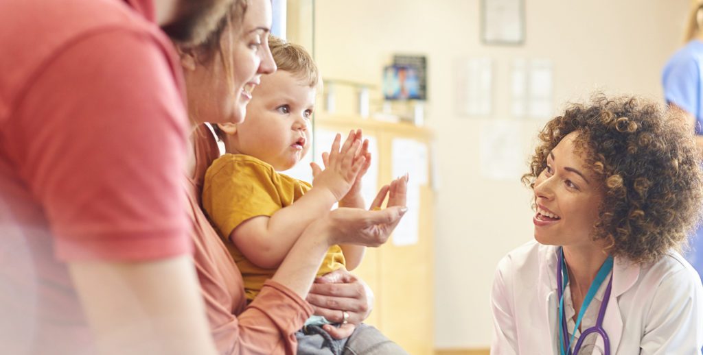 doctor speaks to toddler